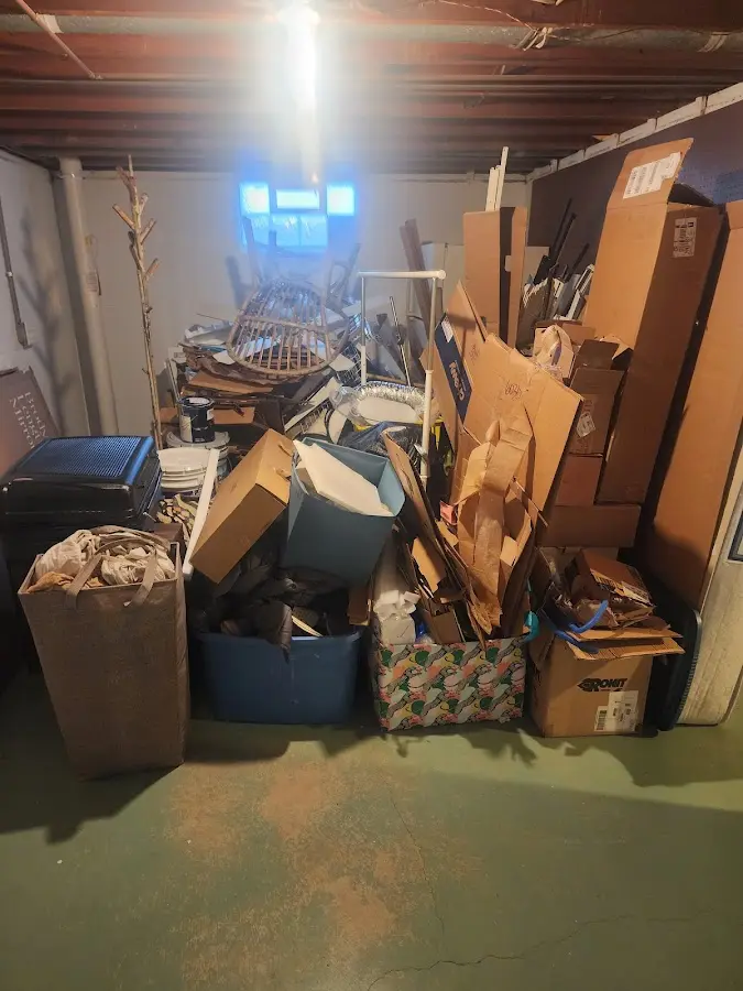 Roll-off dumpster container at job site for 2 Yard Dumpster Rental in Palm Coast